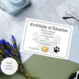 May include: A white certificate of adoption with a paw print design. The certificate reads "This is to certify that... has officially adopted... on the... day of... in..." The certificate is signed by "Casa & Jack Lo" and dated "July 3, 2023".