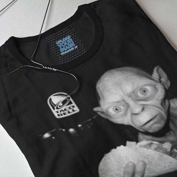 Gollum says it's time for elevensies. Buy this shirt before filthy hobitses takes them all. This LOTR / Taco Bell collab is precious.