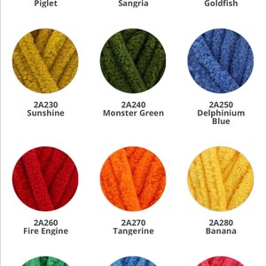 May include: A collection of ten yarn colors, each displayed in a circle. The colors are: Piglet (pink), Sangria (red), Goldfish (orange), Sunshine (yellow), Monster Green (green), Delphinium Blue (blue), Fire Engine (red), Tangerine (orange), Banana (yellow), Shamrock (green), Island Blue (blue), and Flamingo Pink (pink).