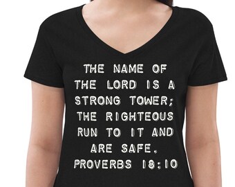 May include: Black v-neck t-shirt with white text that reads "THE NAME OF THE LORD IS A STRONG TOWER; THE RIGHTEOUS RUN TO IT AND ARE SAFE. PROVERBS 18:10"