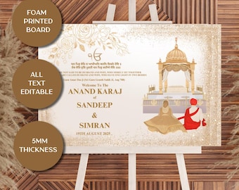 May include: A wedding welcome sign on a white easel. The sign features gold text and illustrations, including floral designs and a temple. The sign reads "Welcome To The Anand Karaj of Sandeep & Simran 19th August 2025". The sign is a foam printed board with a 5mm thickness.