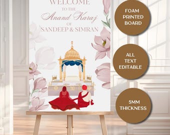 May include: A welcome sign for an Anand Karaj wedding, featuring the names Sandeep & Simran. The sign is on a wooden easel, with floral illustrations and a gold and blue temple design. The sign is a foam printed board with all text editable and 5mm thickness.