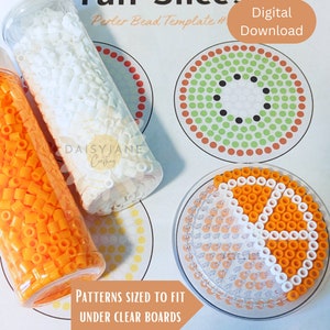 May include: A craft kit with Perler beads and templates for creating fruit slice designs. The image shows clear bottles filled with white and orange beads, along with a completed orange slice design. Text includes "Fruit Slices" and "Digital Download."