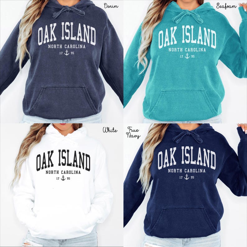 May include: Four hoodies in denim, seafoam, white, and true navy. Each has a drawstring hood and a front pocket. The text "OAK ISLAND NORTH CAROLINA 17 95" is printed on the front in white.