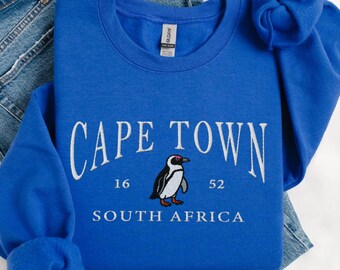 Broderad tröja från Kapstaden, rundhalsad tröja med broderi från Sydafrika, semestertröja från Kapstaden, resesouvenir med Penguin-motiv