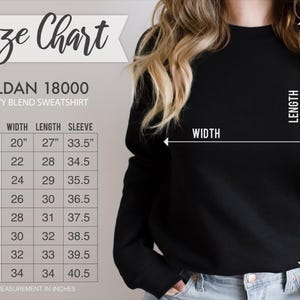 May include: Size chart for a Gildan 18000 heavy blend sweatshirt. The chart shows measurements in inches for width, length, and sleeve length for sizes S through 5XL.