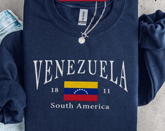 Broderad tröja med Venezuelas flagga, rundhalsad tröja med broderi, semestertröja med Caracasmotiv, venezuelansk resesouvenir