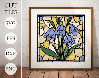 May include: A stained glass style illustration of blue flowers with yellow and green accents. The image is framed in a brown frame.