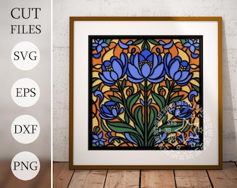 May include: A digital file for a stained glass style floral design with blue flowers and yellow, orange, and green leaves. The design is framed in black and set against a white background.