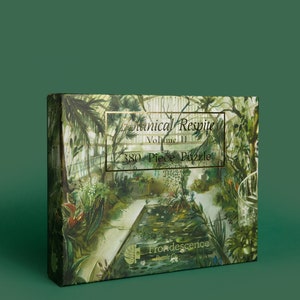 May include: A 380 piece jigsaw puzzle featuring a botanical illustration of a greenhouse with lush greenery and a pond. The box features the text "Botanical Respite Volume II" and "Frodescence".