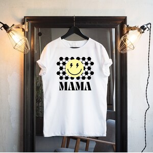 Soccer Mom Short-Sleeve Unisex T-Shirt: Lightning smiley face on soccer ball patterned background