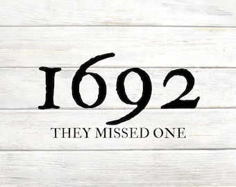 May include: Black and white image of the number 1692 on a white wood background. The text "They missed one" is below the number.
