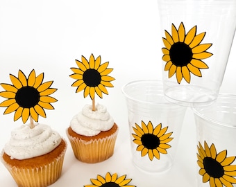 May include: Yellow and black sunflower cupcake toppers and matching sunflower stickers on clear plastic cups.