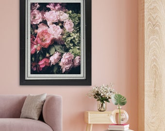 May include: A framed print of a vintage-style photograph of pink and white flowers. The flowers are arranged in a bouquet and have a soft, faded look. The frame is black with a silver inner border.