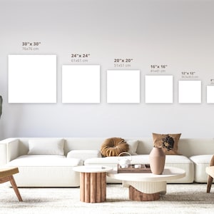 May include: A white wall with six different sized white square frames. The frames are arranged in a row from largest to smallest. The frames are labeled with their dimensions in inches and centimeters. The largest frame is 30 inches by 30 inches, or 76 centimeters by 76 centimeters. The smallest frame is 8 inches by 8 inches, or 20 centimeters by 20 centimeters.