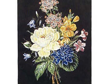 May include: A bouquet of flowers with white, yellow, blue, and pink blooms against a black background. The bouquet includes a large white rose, yellow flowers with a star-shaped center, blue flowers with a star-shaped center, and pink flowers with a ruffled edge.