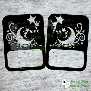 May include: Two black and white vinyl decals featuring a crescent moon with stars and swirls. The decals are for light switch covers and have the text "Ace and King Vinyl & Supply" on them.