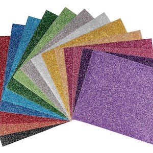 May include: A fan of 14 different colored glitter cardstock sheets. The colors are black, red, dark blue, teal, green, silver, gold, yellow, orange, pink, purple, dark purple, navy blue, and light blue.