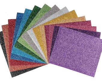 May include: A fan of 14 different colored glitter cardstock sheets. The colors are black, red, dark blue, teal, green, silver, gold, yellow, orange, pink, purple, dark purple, navy blue, and light blue.