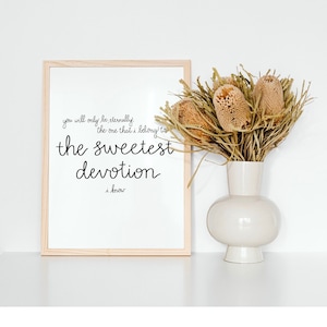 May include: A framed print with a white background and black text that reads "you will only be eternally the one that i belong to the sweetest devotion i know".