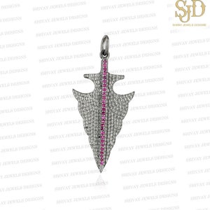 May include: A silver arrowhead pendant with a line of pink gemstones down the center. The arrowhead is covered in small, clear gemstones.