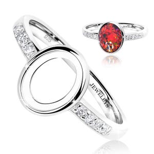 May include: A pair of silver rings. One ring features a large oval-shaped, red gemstone with a sparkling band. The other ring has a unique open-circle design with a band of small, clear gemstones. The rings are marked with "925" and "JEWELETS".