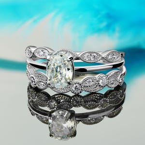 Cubic zirconia ring, engagement ring, silver ring, classic engagement ring, rhodium plated ring, gold plated ring, cubic zirconia stones, center stone, side stones, silver jewelry, fine jewelry, sterling silver ring, luxury ring, wedding ring,