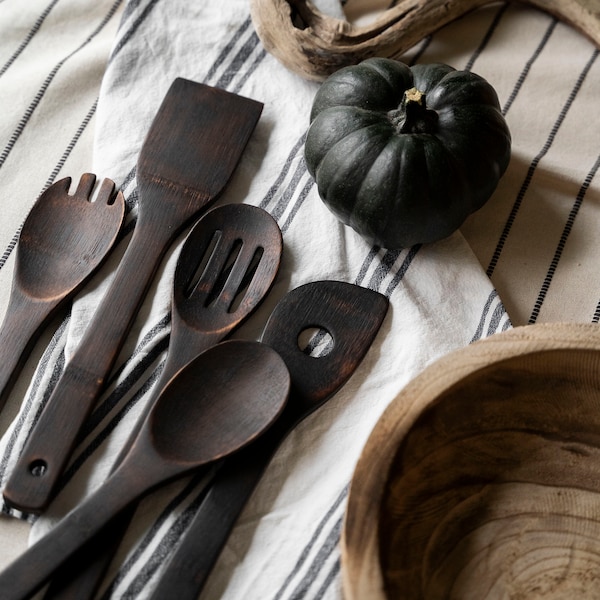 Set of natural bamboo utensils for cooking made in Yakisugi style with bamboo mug. Eco sustainable kitchen. Wooden spatula, spoon. Handmade