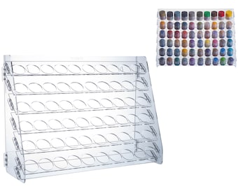 Pode incluir: Estante de pintura de acrílico transparente com 36 ranhuras para guardar pequenos frascos de tinta. A estante é inclinada para facilitar o acesso aos frascos.