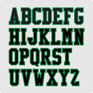 May include: A full alphabet in a bold, collegiate font. Each letter is black with a green outline, set against a light grey background. The letters are arranged in rows, showcasing the full range from A to Z.