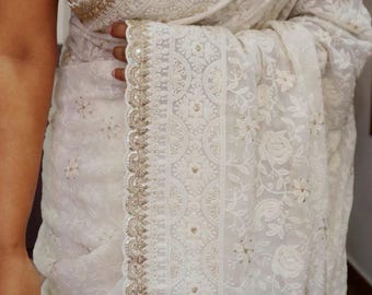 Chikankari work  on pure Georgette silk saree off white with floral Gotawork embroidery and scalloped borders,Khaddi Georgette silk sari.