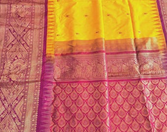 Semi Gadwal pattu  saree in yellow color with buta and big purple borders, Blouse piece – South Indian Elegance