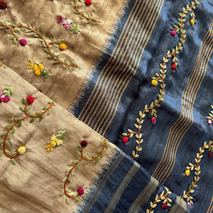 Handcrafted Tussar silk saree featuring delicate French knot embroidery with intricate floral detailing, offering a blend of texture, elegance, and artisanal charm.
