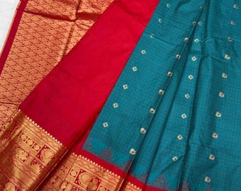 Semi Gadwal pattu check saree in blue color with big red borders and Blouse piece – South Indian Elegance