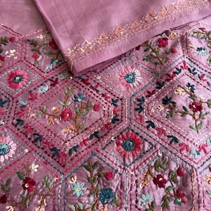 Pink Tussar silk saree featuring intricate Lambani and Kantha floral embroidery, elegant handcrafted ethnic saree with matching blouse piece, perfect for weddings, parties, festive occasions, and traditional celebrations.
