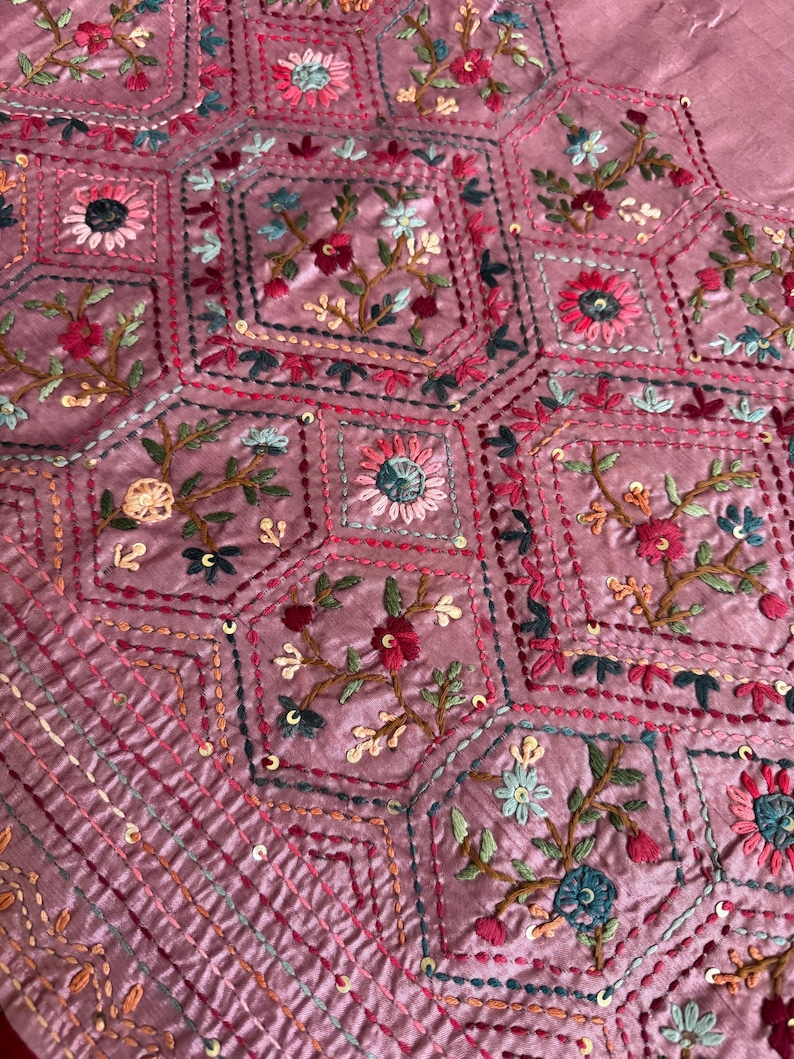 Pink Tussar silk saree featuring intricate Lambani and Kantha floral embroidery, elegant handcrafted ethnic saree with matching blouse piece, perfect for weddings, parties, festive occasions, and traditional celebrations.