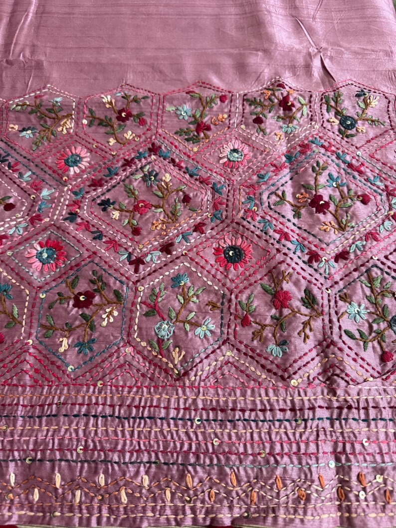 Pink Tussar silk saree featuring intricate Lambani and Kantha floral embroidery, elegant handcrafted ethnic saree with matching blouse piece, perfect for weddings, parties, festive occasions, and traditional celebrations.