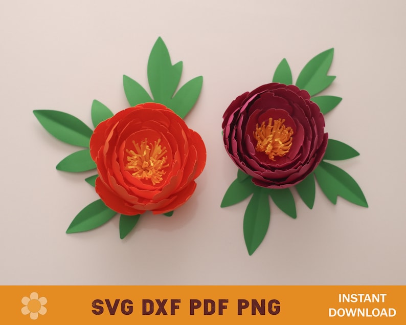 May include: Two paper flowers with green leaves. The flower on the left is orange and the flower on the right is purple.