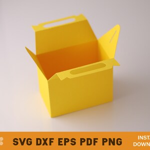 May include: A yellow paper box with a handle on the top and a flap on the side. The box is open and empty.