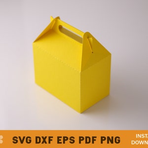 May include: A bright yellow paper box with a handle on top. The box is designed to be folded and assembled.