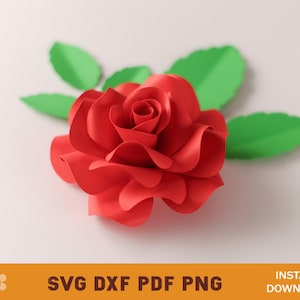 May include: A red paper rose with green paper leaves. The rose is made of multiple layers of paper, giving it a 3D effect.