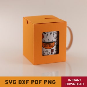 May include: Orange cardboard box with a cut-out window showing a white mug with a black and white coffee themed design. The mug has the word "COFFEE" printed on it.