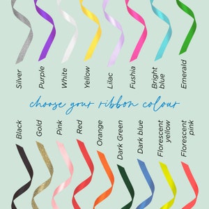 May include: A chart showing different ribbon colors to choose from. The colors are: black, silver, gold, pink, red, orange, dark green, dark blue, florescent yellow, florescent pink, purple, white, yellow, lilac, fuschia, bright blue, and emerald.