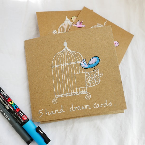 Hand drawn note cards, notelets, pretty birds & cages. Five unique cards in case. Original drawings, not printed. Paint markers on kraft.
