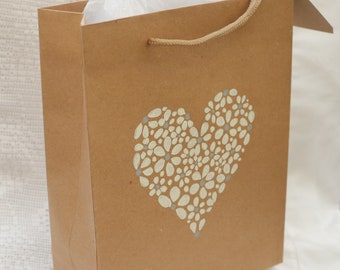 Gift bag - medium sized, hand drawn. A heart of daisies in cream and grey on brown kraft paper. Original drawing, not a print.