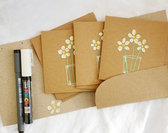 Hand drawn note cards, notelets, daisies in a glass. Five unique cards in case. Original drawings, not printed. Paint markers on kraft.