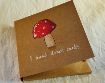 Hand drawn note cards, notelets, toadstools. Five unique cards in case. Original drawings, not printed. Paint markers on kraft.