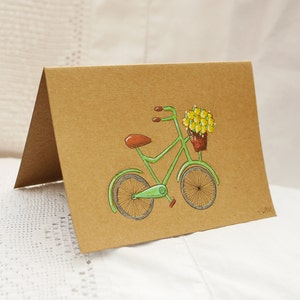 Cartão desenhado à mão - bicicleta com cesta de flores. Azul ou verde. Desenho original, não uma impressão.