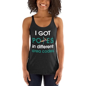 May include: A black tank top with the text "I GOT POLES in different area codes" in white and a green silhouette of a person doing a pole dance.