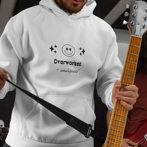 Overworked Underpaid Hoodie: Funny Unisex Sweatshirt